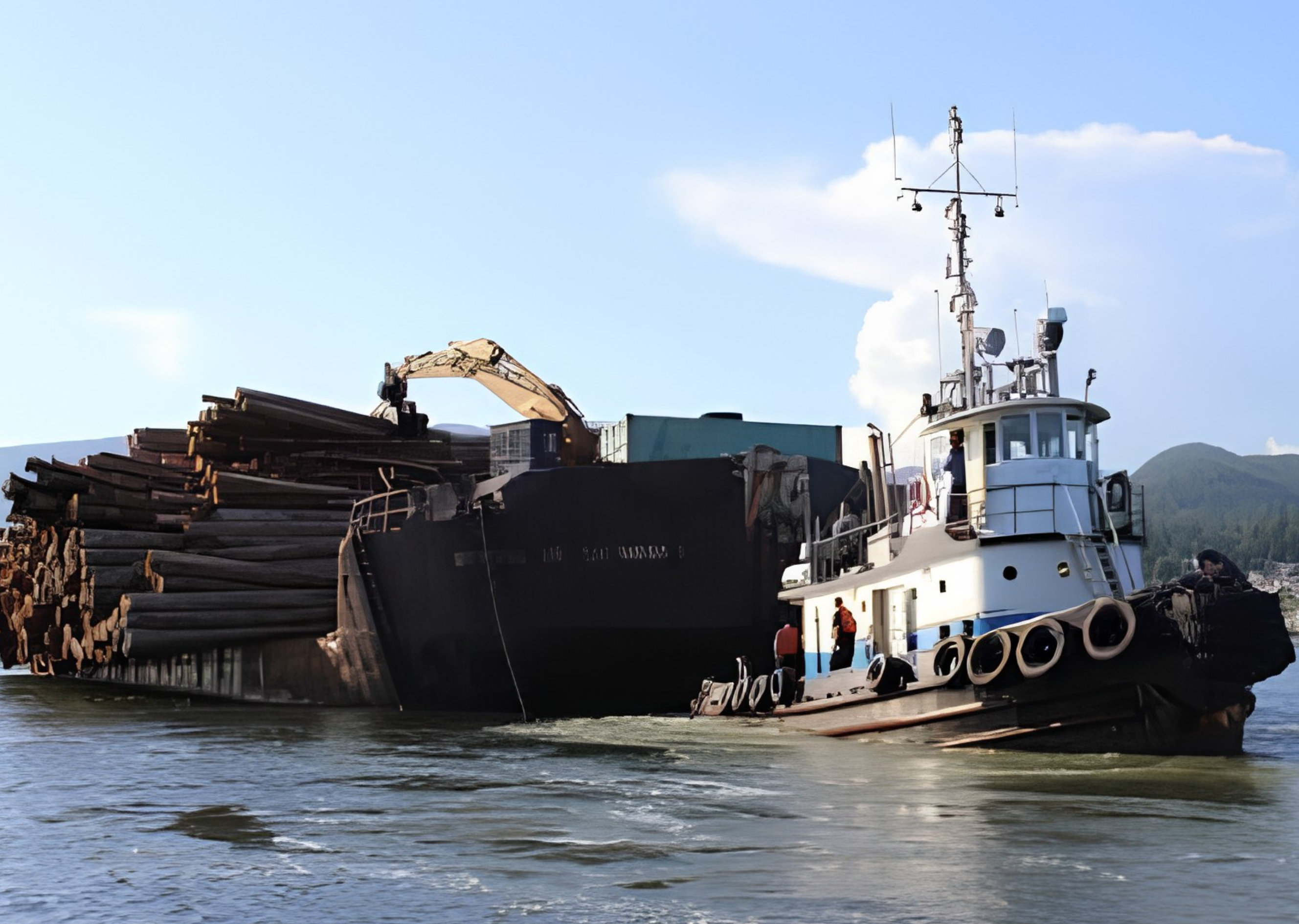 Launch and cargo boat assisting a vessel